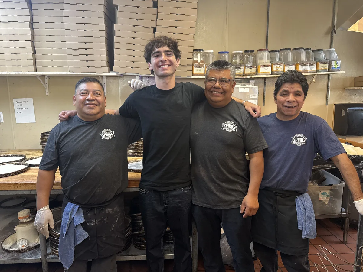 The founder with three members of the Spiro's kitchen team